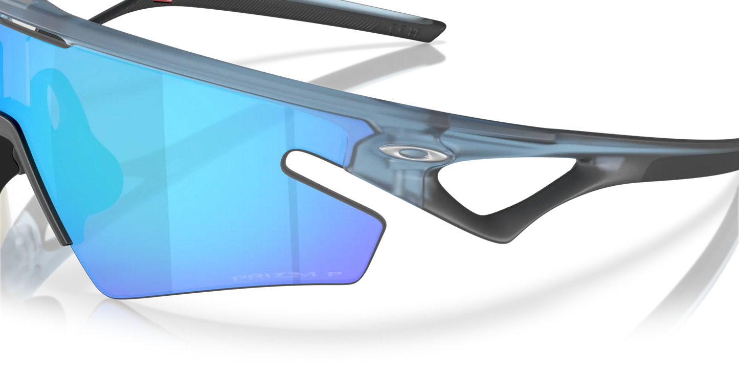 Brýle OAKLEY SPHAERA SLASH Matt Průhledná Kamenná Sklo Prizm Sapphire Polarized - OO9499-0336