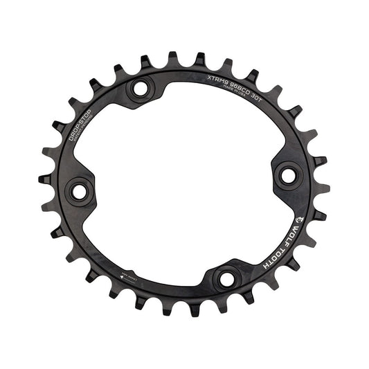 Soikea WOLF TOOTH Shimano XTR M9000/9020 -yksittäiseturatas, 96 BCD, 11-vaihteinen, 4 kiinnitysreikää, 96 mm, musta — eturatas valkoisella taustalla
